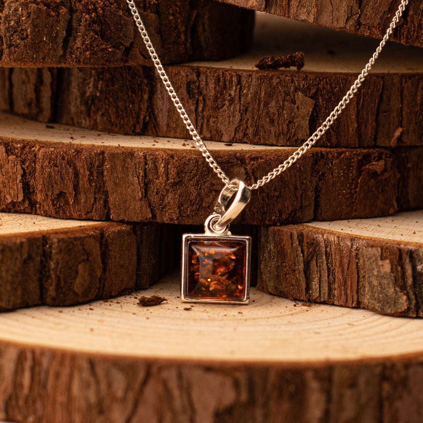 Amber Essence Pendant in 925 Sterling Silver with Amber