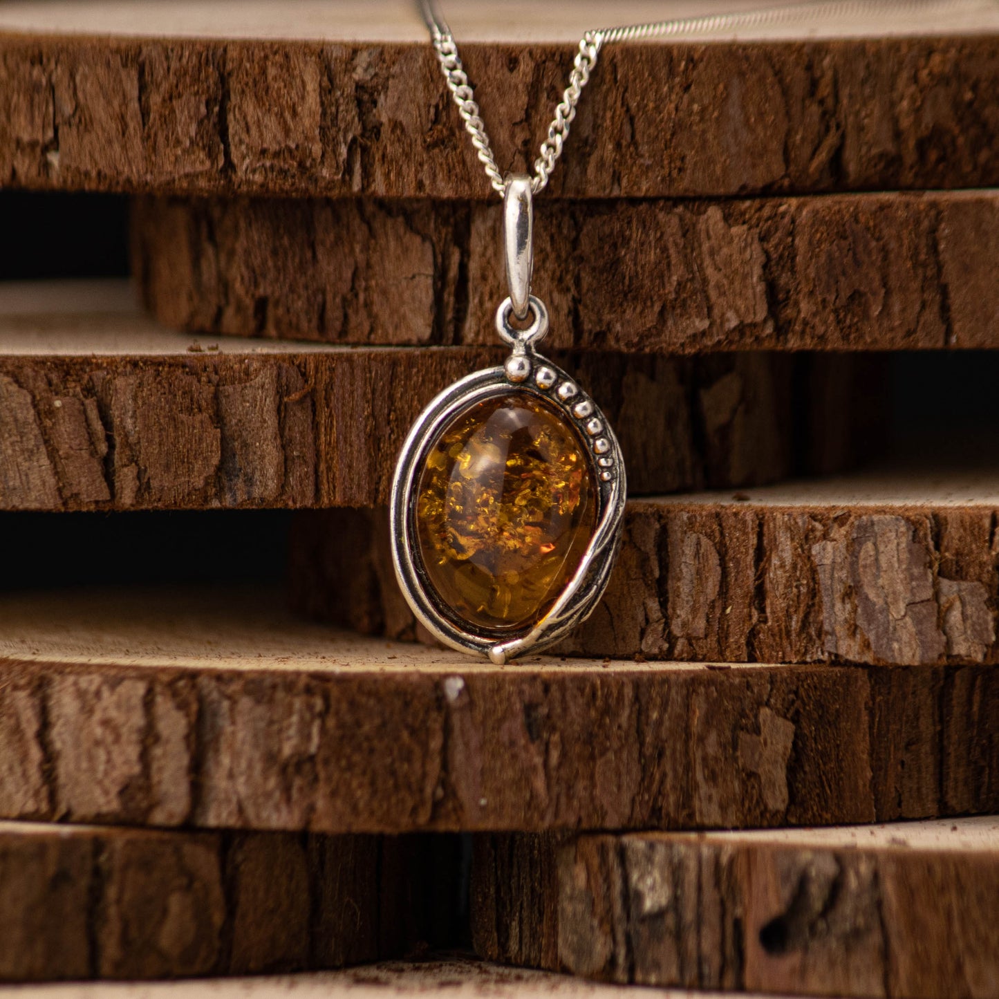 Amber Eye Pendant in 925 Sterling Silver with Amber